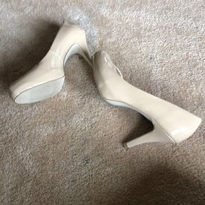 Nude pumps.